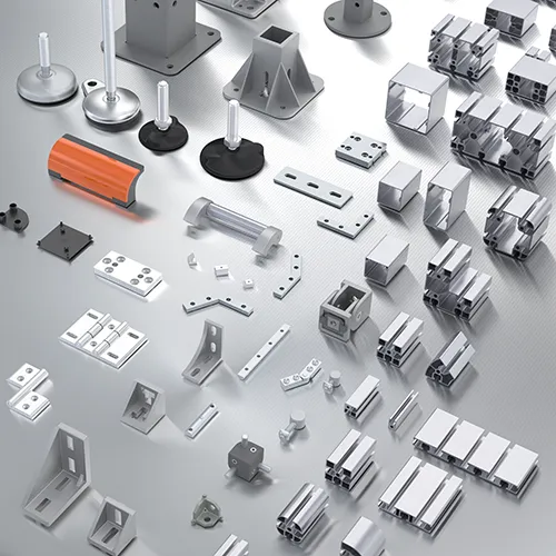 A spread of profiles and accessories compatible with the AC slot. Visible are aluminum profiles of various sizes and shapes, along with accessories such as anchoring bases, swivel feet, handles, and joints.