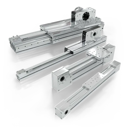 Four linear axes from Alusic's FC line. The carriages and movement mechanisms—belt-driven and bearing-guided—are clearly visible, along with the Alusic aluminum profiles that form their fundamental structure.